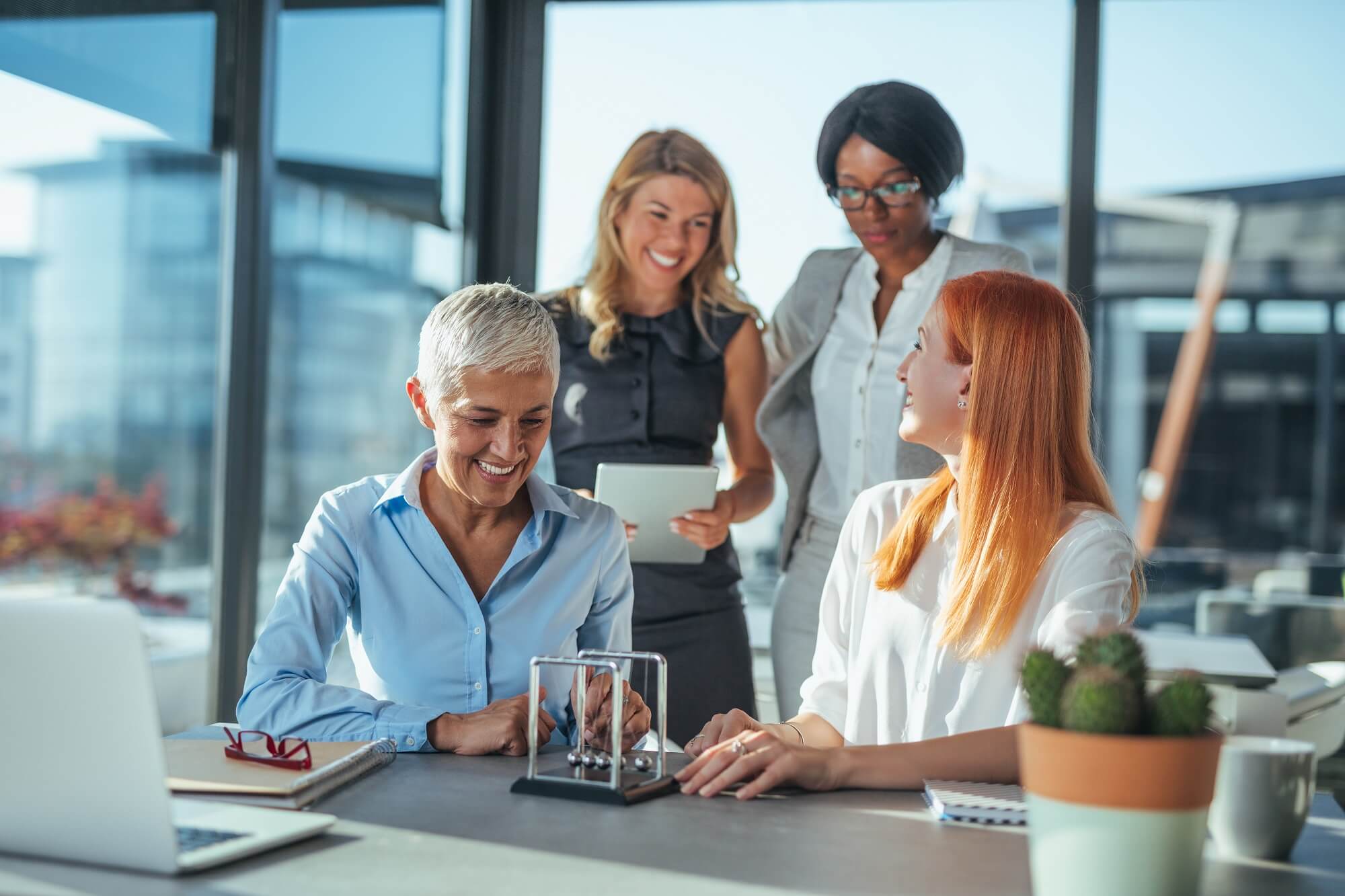 Group of businesswomen discussing business strategy