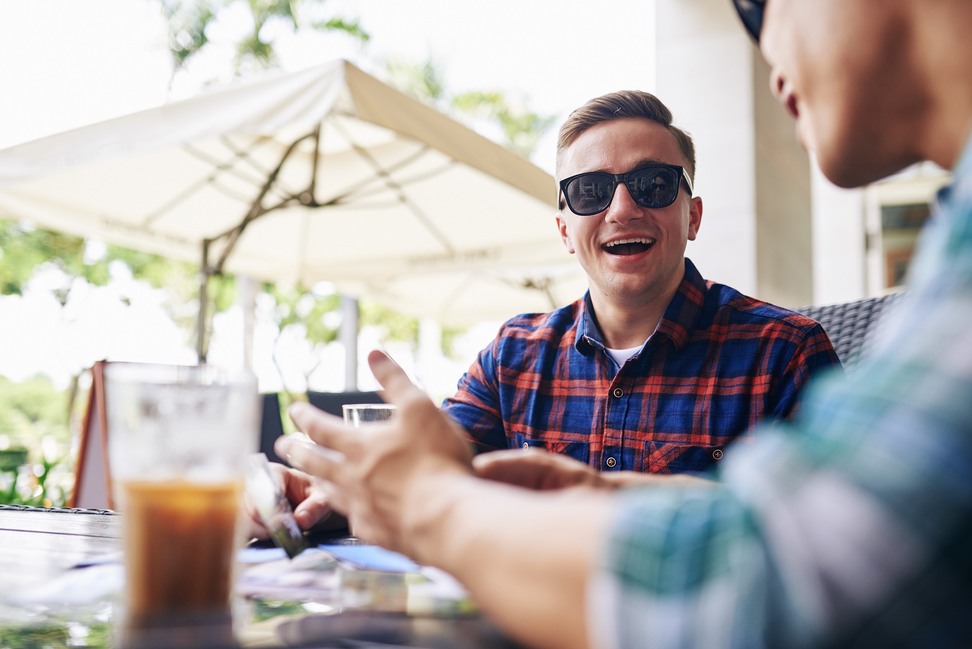 customers sitting on restaurants with outdoor seating