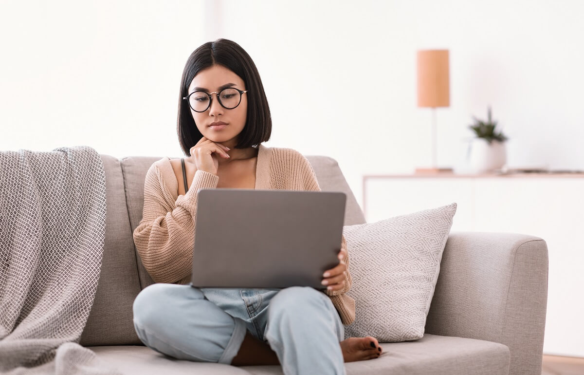 women thinking before writing a review for a product she bought recently