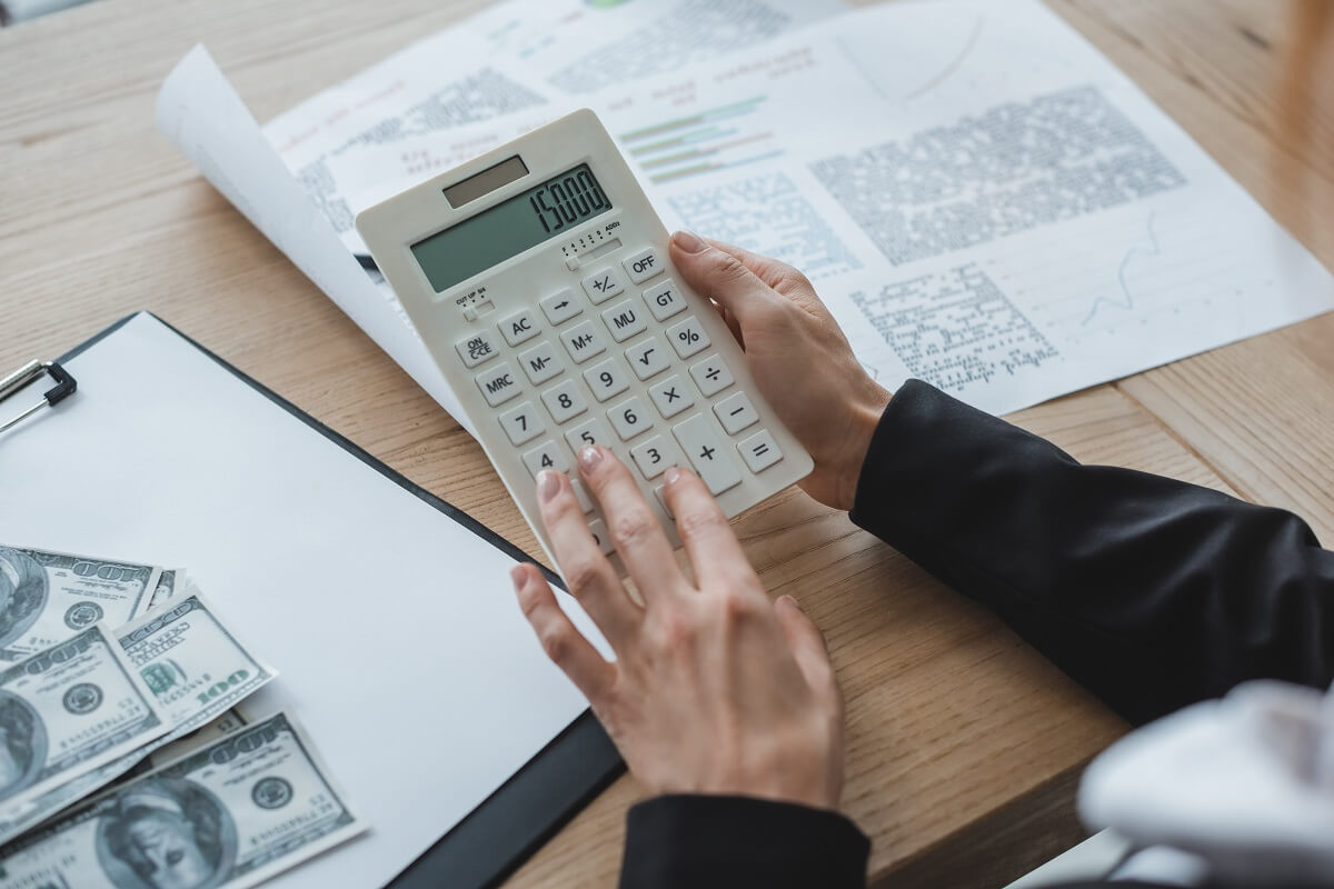  financier using calculator in office
