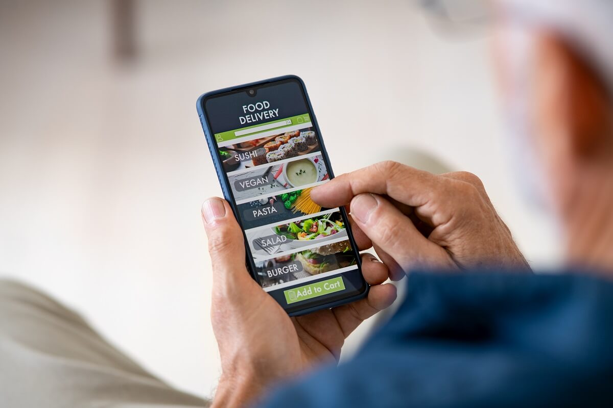  food delivery app with mobile phone to order lunch.