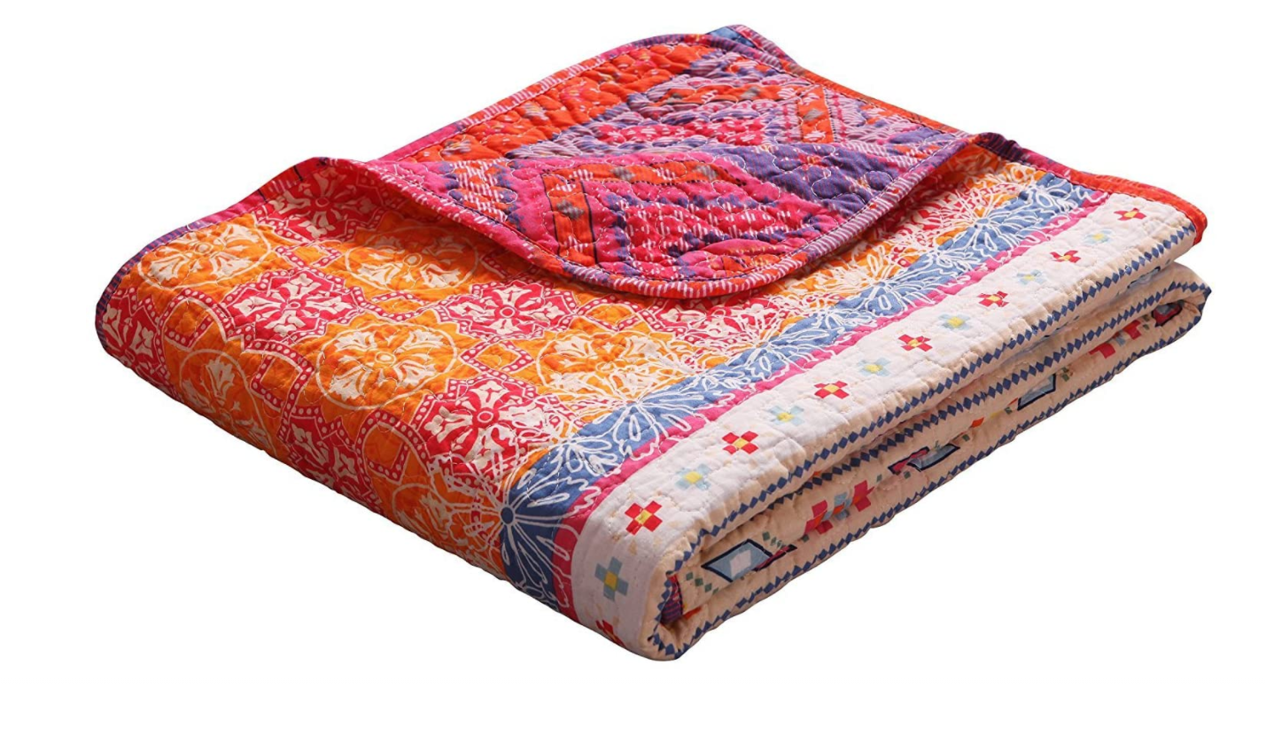 Exclusivo Mezcla Reversible Quilted Throw blanket